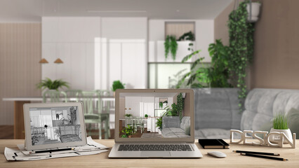 Architect designer desktop concept, laptop and tablet on wooden desk with screen showing interior design project and CAD sketch, blurred background, kitchen, living and room