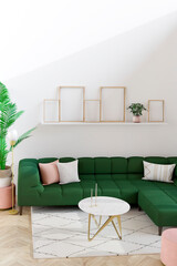 Living room in house with modern interior design, green velvet sofa, coffee table, plant, carpet, mock up poster frame and elegant accessories. 3d render