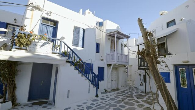 Architectural Splendor: Exploring Mykonos' White Houses and Cobblestone Streets