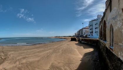 Panoramic view of a beach in Chipiona, a touristic village in Andalusia, South Spain. - obrazy, fototapety, plakaty