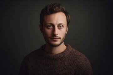Group portrait photography of a pleased man in his 30s wearing a cozy sweater against a minimalist or empty room background. Generative AI