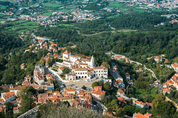 Fototapeta na wymiar Aerial view of Sintra National Palace in Portugal. Landscape with trees and buildings
