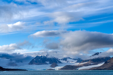 amazing landscape with glaciers and icebergs in summer time