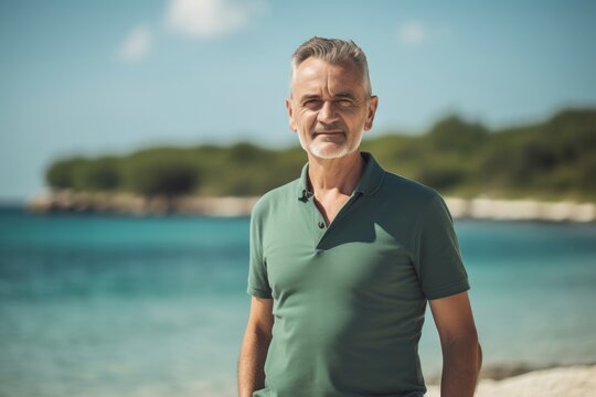 Full-length Portrait Photography Of A Satisfied Man In His 50s Wearing A Sporty Polo Shirt Against A Lagoon Or Hidden Beach Background. Generative AI