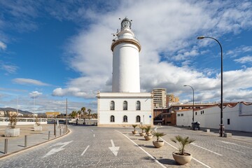 MALAGA, SPAIN - March 08, 2023. Lighthouse Farola in Malaga port