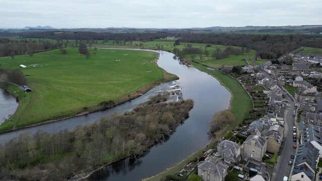 Wide aerial view of Kelso in Scotland with the river and weir