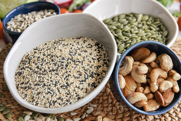 Obraz premium Close-up, a bowl of chia seeds and other healthy foods on the kitchen table.