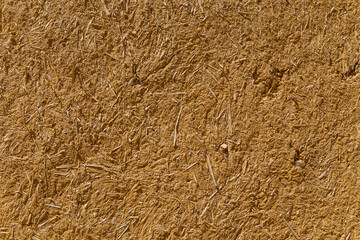 clay and straw material weathered wall