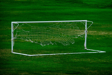Worn Out Soccer Net on Goal Ratty and Frayed Netting