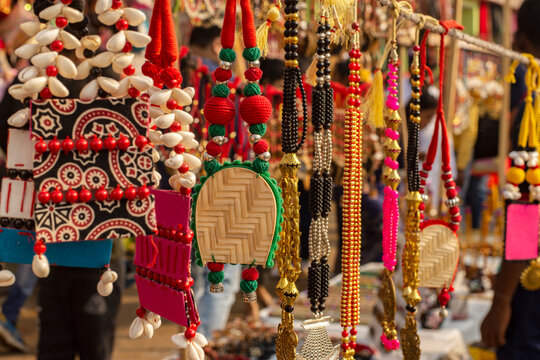 Beautiful Bengali traditional jewelery, works of handicraft, for sale during Handicraft Fair in Kolkata. Selective focus.
