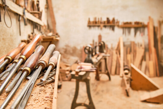 artisan carpentry workshop with turning tools in the foreground