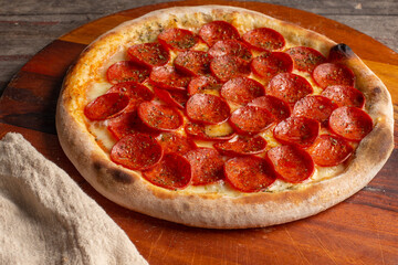 Pepperoni pizza in Brazil is called Pizza de calabresa