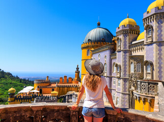tour tourism in Sintra- Woman tourist enjoying view of Pena castle