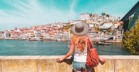 Young woman tourist enjoying beautiful view of Porto city,  summer travel destination,  vacation,...