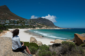 Woman at Llandudno beach, Cape Town South Africa