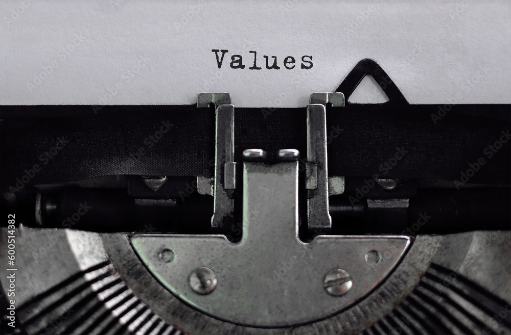 Poster text values typed on retro typewriter