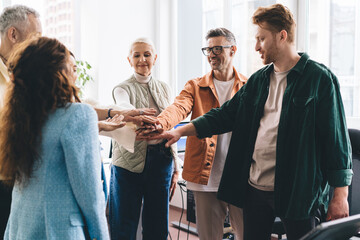 Experienced male and female colleagues found solution for business brainstorming enjoying synergy collaboration in office workspace, successful colleagues agreed with association merger briefing