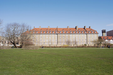 Large building in the center of Copenhagen in Denmark with a clear blue sky