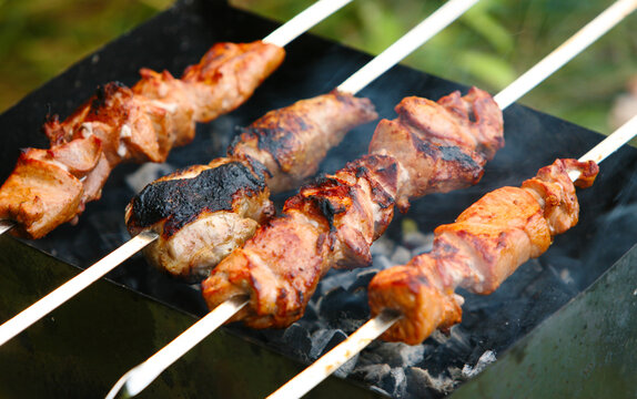 cooking shish kebab on a charcoal