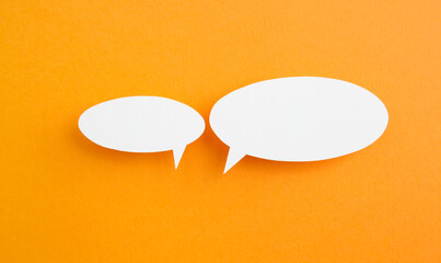 paper speech bubble on yellow background