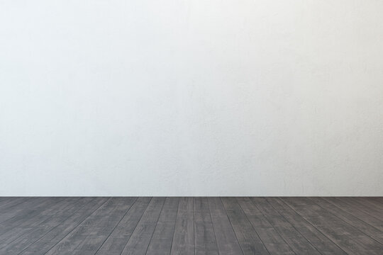 empty room with white wall and wooden floor