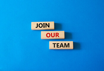 Join our team symbol. Wooden blocks with words Join our team. Beautiful blue background. Business and Join our team concept. Copy space.