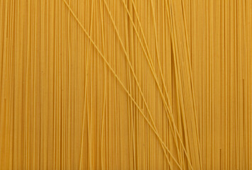 Spaghetti uncooked close up background.