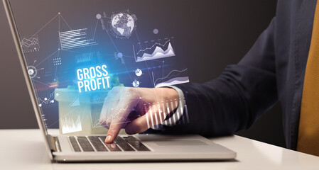 Businessman working on laptop, business concept