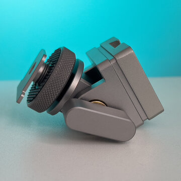 Close Up of Camera Accessory V-Mount and Cold Shoe
