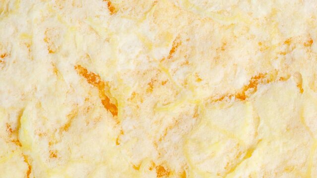 Orange peel on inside, moving sideways, close-up macro, top view
