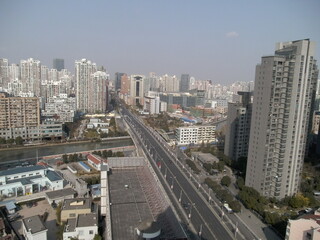Fototapeta premium Skyscrapers in Shanghai photographed from top of a building