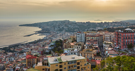 Fototapeta na wymiar Naples, Italy. Beautiful sunset lights over the Naples' Bay