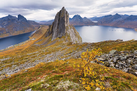 Panorama view from Mt Hesten towards Mt Segla surrounded by two beautiful fjords, Oyfjorden and Mefjorden, in Troms og Finnmark, Norway