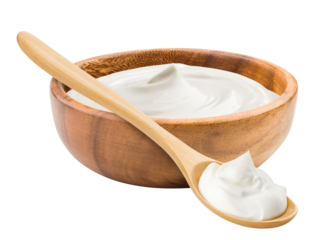 sour cream in wooden bowl and spoon, mayonnaise, yogurt, isolated on white background, full depth of field