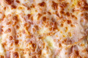 Pizza con prosciutto e formaggio, dettagli, primo piano