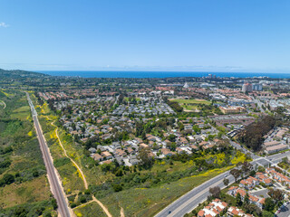 Aerial view over houses and condos in San Diego and ocean on the background,, California, USA