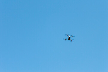 Naklejka na ściany i meble A flying drone that captures a beautiful panorama
