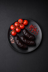 Delicious black blood sausage or black pudding with spices and herbs