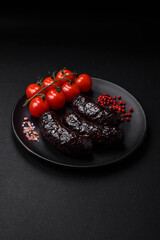 Delicious black blood sausage or black pudding with spices and herbs