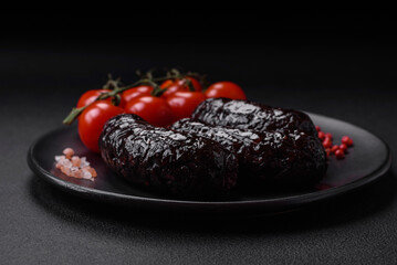 Delicious black blood sausage or black pudding with spices and herbs