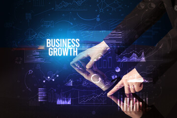 Businessman touching huge screen concept