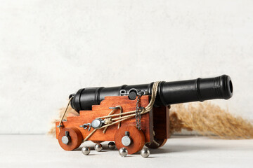 Toy model of cannon on light background