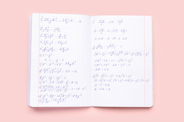Fototapeta premium Copybook with maths formulas on pink background