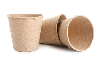 Peat pots for gardening on white background