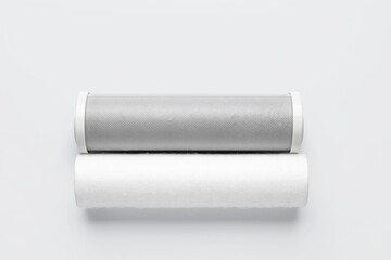 New water filter cartridges on grey background