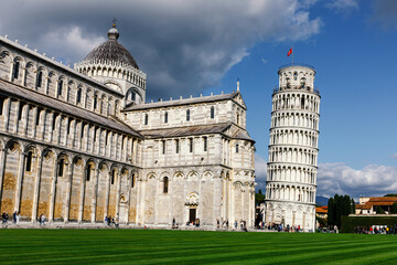 Dramatic clouds over the famous Pisa Tower. One of the most popular tourist places in the world.