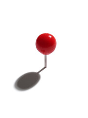 Red pin with shadow on white