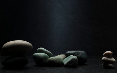 stones on dark gray background for podium background