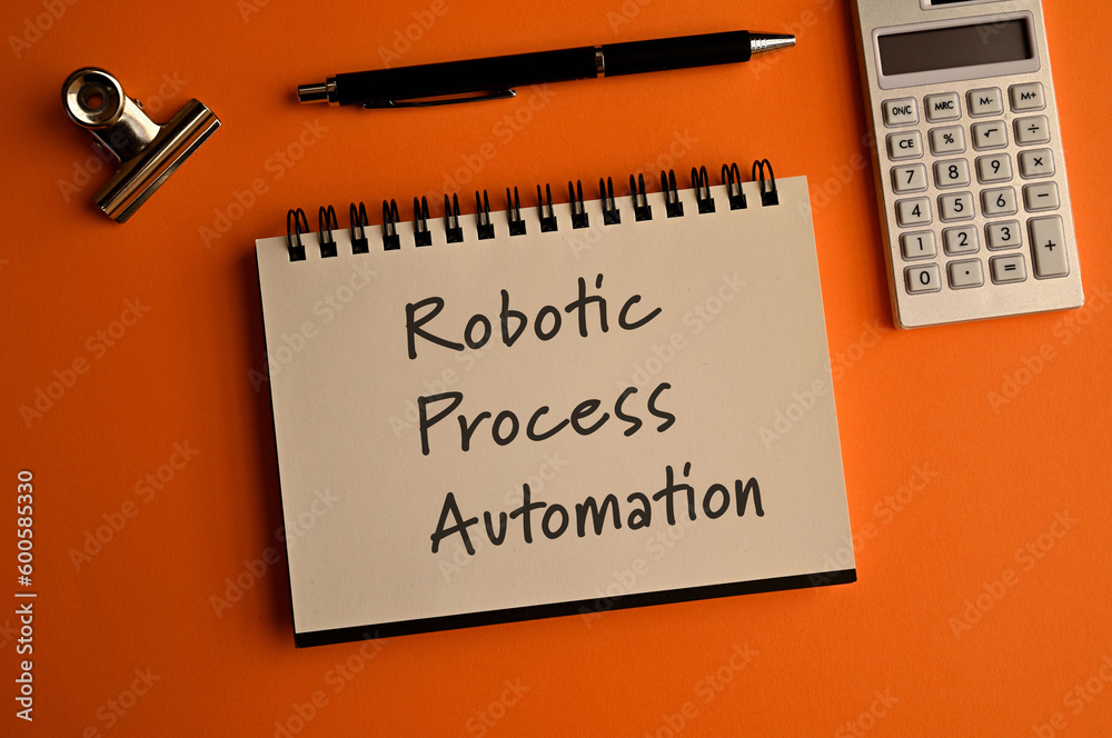 Poster there is notebook with the word robotic process automation.it is as an eye-catching image.