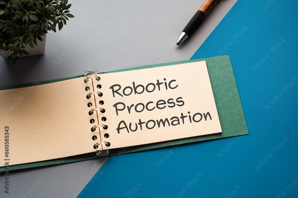 Poster there is notebook with the word robotic process automation. it is as an eye-catching image.